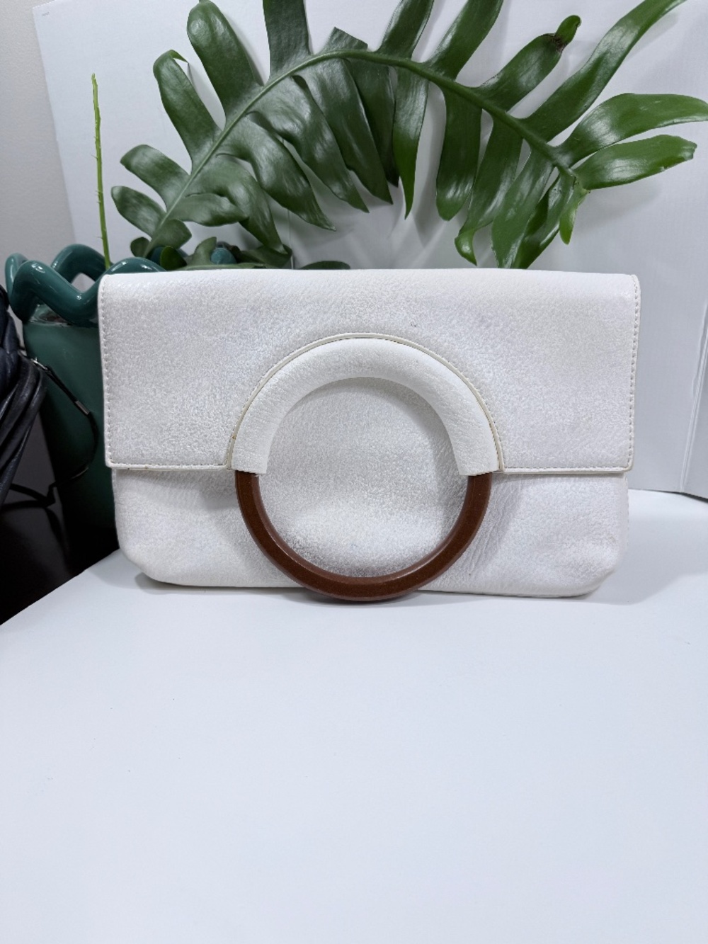 Kaari Blue Wooden Handle White Clutch Bag
